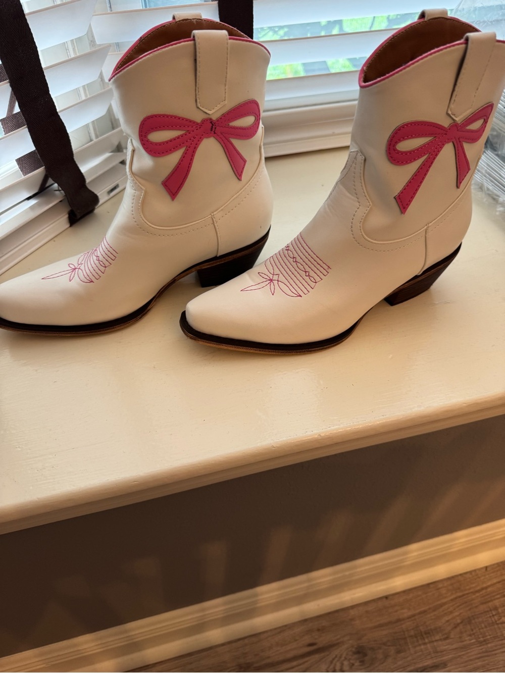 White Ankle Cowboy Booties with Pink Bow Accent
